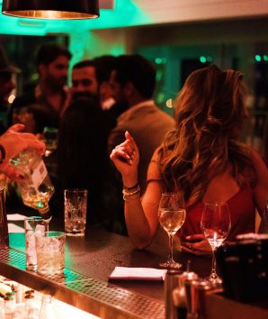 People partying at the bar