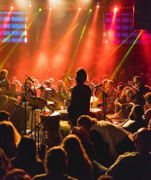 Live music venue with fans celebrating