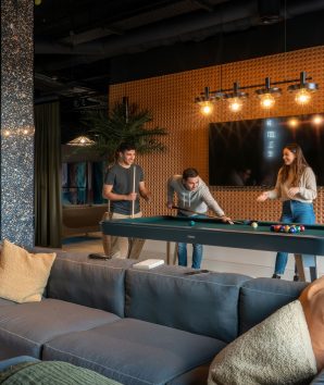 Students playing pool in a Gaming Zone