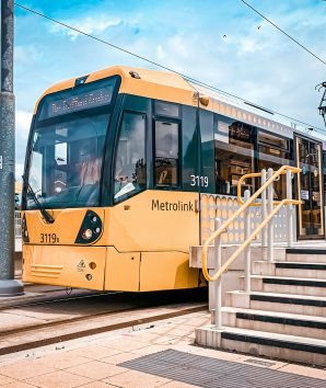 Yellow tram going towards the Trafford Centre